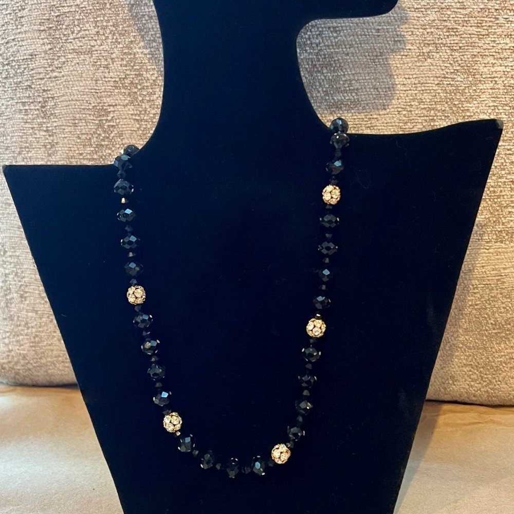 Black faceted crystal with gold and crystal beads
